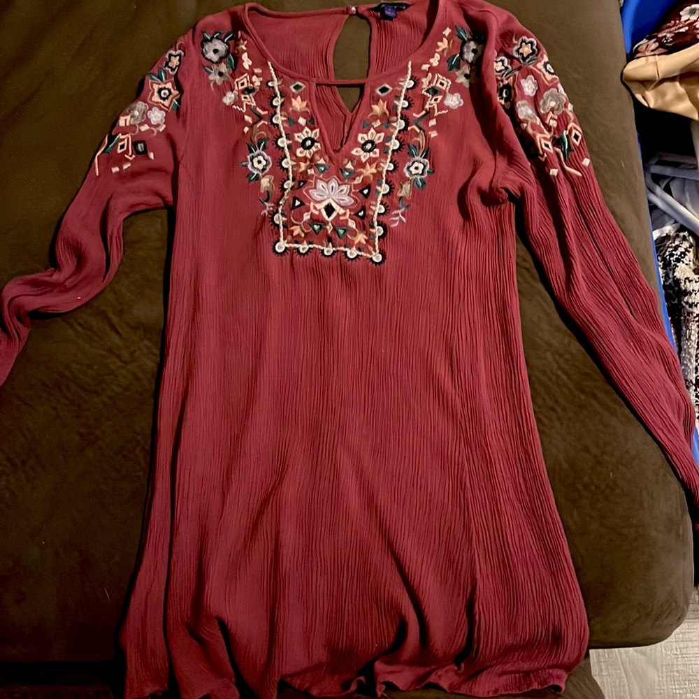 Long sleeve maroon dress with flower design